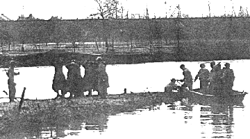 L Company, 253rd Infantry with German POW's Sarreguemines, France