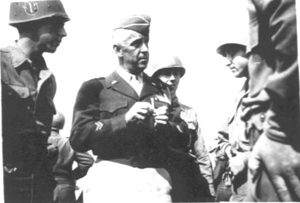 Gen Hibbs teaches troops how to roll cigarettes