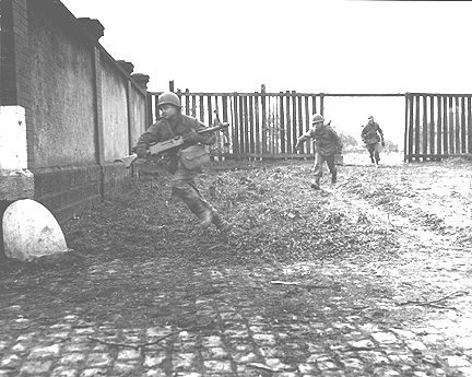 Machine gun crew on the move-253d Inf