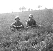 Hq Btry 861st FA Bn soldiers on a break