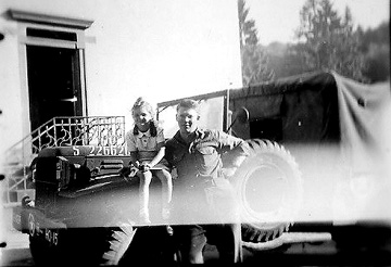 863d member with local child- Germany 1945