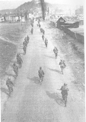 63d Infantry Division Troops enter Homburg, Germany Mar 45