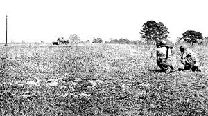 Franc, 63d Band firing bazooka, Cp Van Dorn, MS 1944