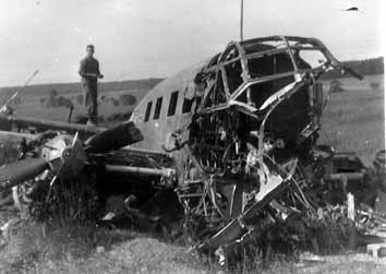 Jacobus, Hq 254th Inf and wrecked German aircraft- 1945