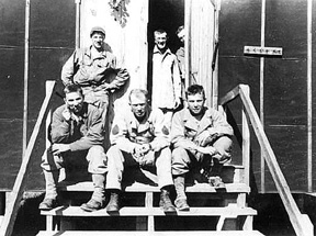 A/253d troops on barracks steps Cp Van Dorn 44