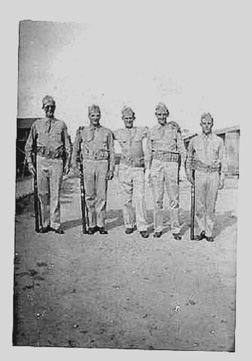 A/253 Inf troops preparing for guard duty, Cp Van Dorn 44