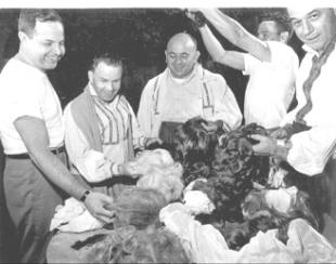 WWII cast of Carmen selecting wigs for 1985 production