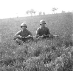 Hq Btry 861st FA Bn soldiers on a break