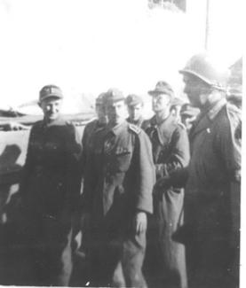 German POWs escorted by 63rd soldier