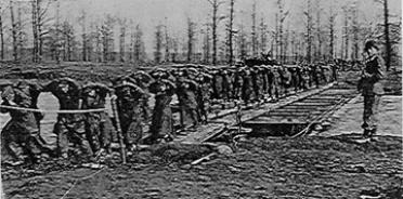 POW's move across a pontoon bridge- Germany 1945