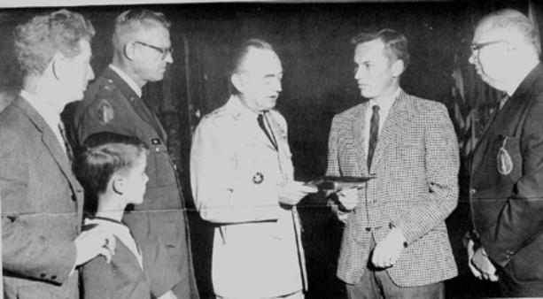 63d personnel presenting plaque