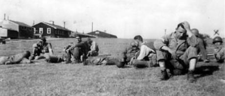 H/253d troops taking  a break Cp Van Dorn MS 1944