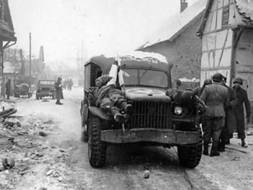 Ambulance transport dead soldiers from Jebsheim, France Jan 45