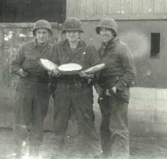Hq Co 254th troops with homemade pies- Rexigen, France